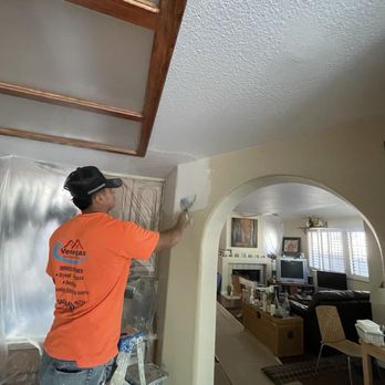 Venegas Panting & Drywall - Working on finishing the repair - Painters Near Me - Colton, California Venegas Panting & Drywall - Working on finishing the repair - Painters Near Me - Colton, California