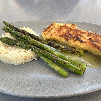 Tommy Bahama - Macadamia Nut Crusted Halibut - Seafood Near Me - Newport Beach, California Tommy Bahama - Macadamia Nut Crusted Halibut - Seafood Near Me - Newport Beach, California