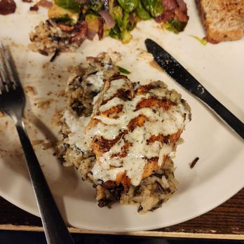 Dublin Bay Irish Pub & Grill - Lemon dill salmon over pilaf and Brussels sprouts,red onion w bacon goodies!! - American Near Me - Ames, Iowa