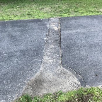 Miles of Excavating - a crack in a driveway - Septic Services Near Me - Wrentham, Massachusetts Miles of Excavating - a crack in a driveway - Septic Services Near Me - Wrentham, Massachusetts