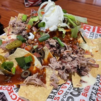 Full Moon Bar-B-Que - ows a plate of nachos - Barbeque Near Me - Montgomery, Alabama