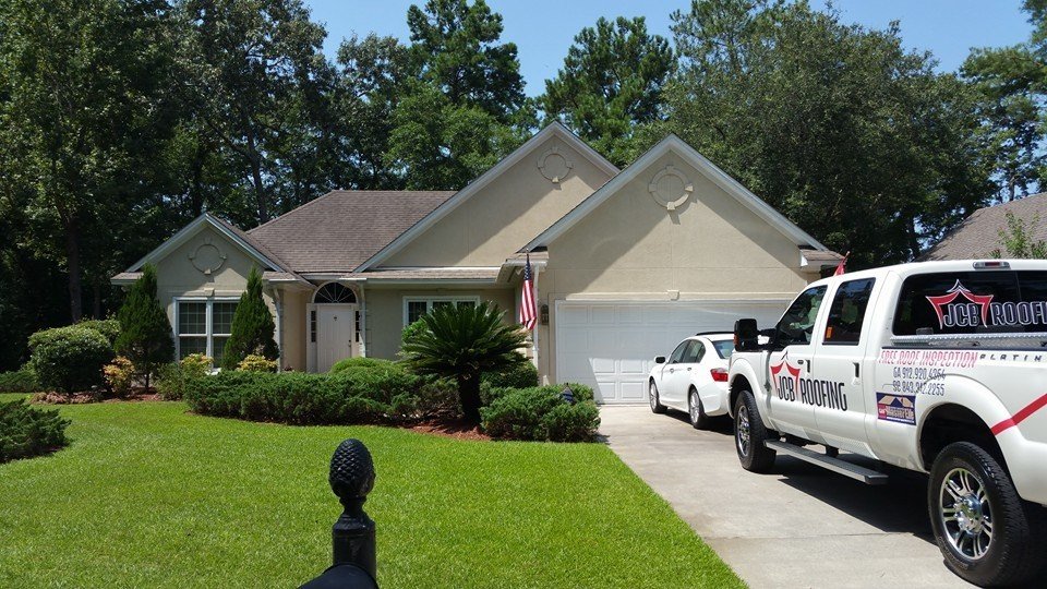 Slide of JCB Roofing