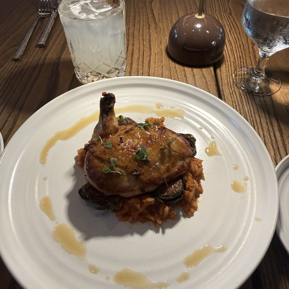 The Lowline Hotel - Roasted chicken on red rice - Hotels Near Me - Charleston, South Carolina