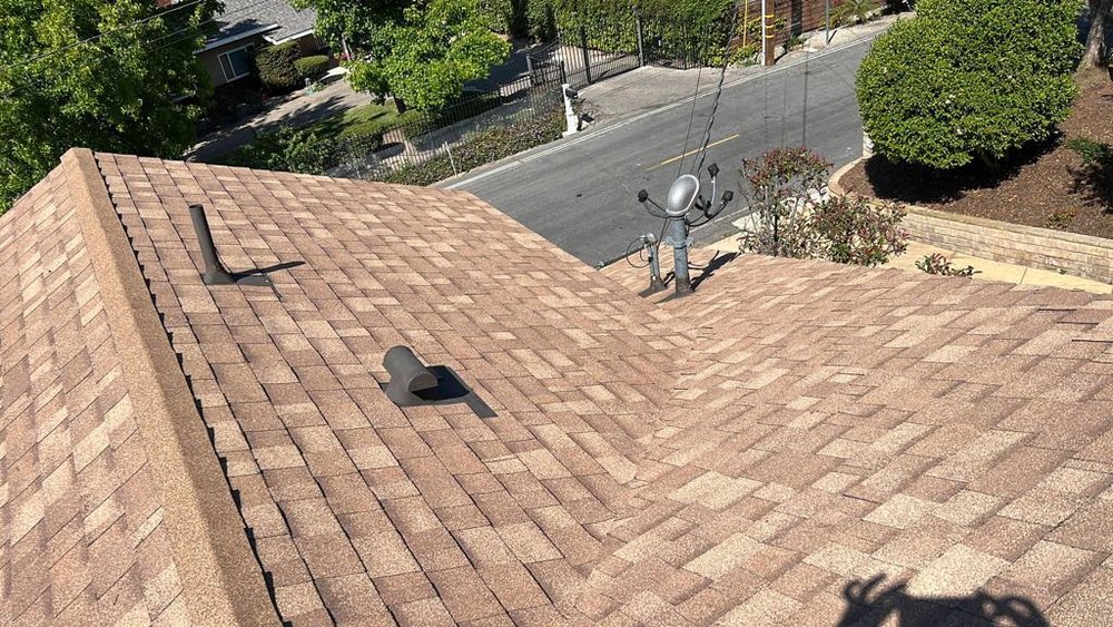 Slide of SLR Roofing