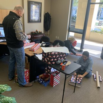 Pierce Insurance Group - Wrapping presents for a family in need! - Insurance Near Me - McKinney, Texas Pierce Insurance Group - Wrapping presents for a family in need! - Insurance Near Me - McKinney, Texas