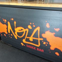 Nola Sauce Bar - Cool logo.