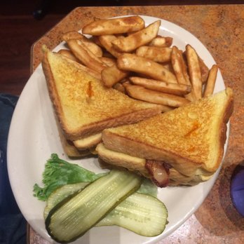 The Satellite Diner - THE BILLY BREEN* ...$13.95 A burger patty, bacon, cheese, and fries with two grilled cheese sandwiches for a bun - Breakfast & Brunch Near Me - Spokane, Washington The Satellite Diner - THE BILLY BREEN* ...$13.95 A burger patty, bacon, cheese, and fries with two grilled cheese sandwiches for a bun - Breakfast & Brunch Near Me - Spokane, Washington
