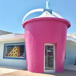 Islands Best Rentals - Islands Best Rentals, Don't pack it, Rent it! the building with the Big Pink Pail
