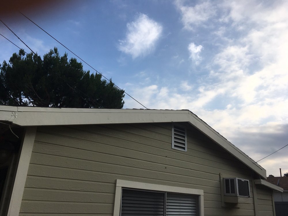 Slide of MA Roofing and Gutters