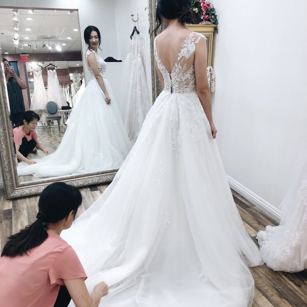 Tomato Wedding - The dress was customizable, she offered to take out some of the layers because it felt really heavy. - Bridal Near Me - Buena Park, California Tomato Wedding - The dress was customizable, she offered to take out some of the layers because it felt really heavy. - Bridal Near Me - Buena Park, California
