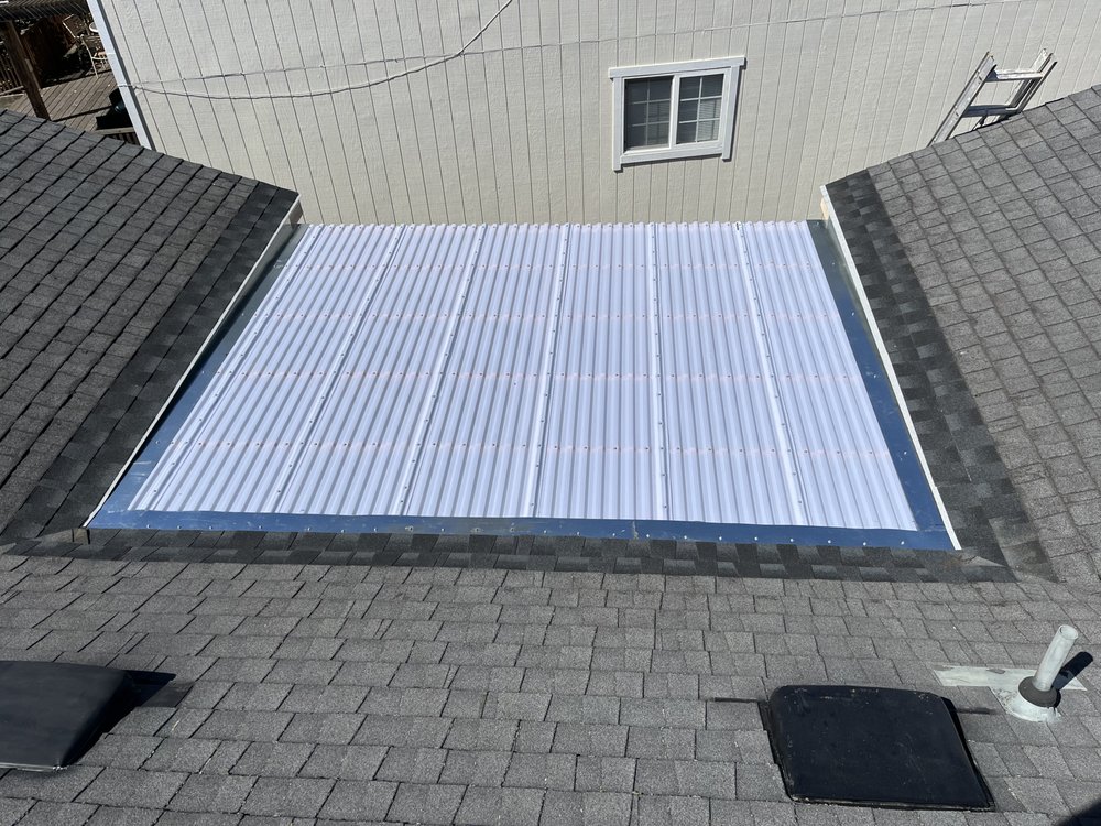 Slide of West Coast Roofing Services