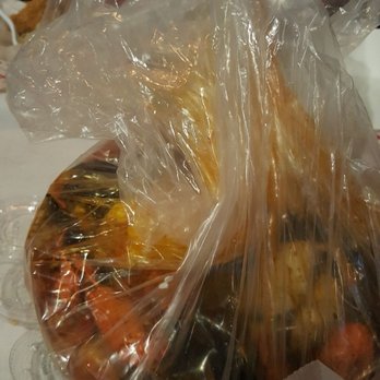 Cap't Loui - Bag 2: medium spicy, Louisiana sauce, crawfish, shrimp (head off), mussels, clams, corn, potato - Seafood Near Me - Braintree, Massachusetts