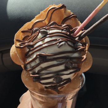 Double Three - Classic bubble waffle with vanilla ice cream, chocolate chips, Pocky, and Nutella drizzle! - Ice Cream & Frozen Yogurt Near Me - Kailua, Hawaii Double Three - Classic bubble waffle with vanilla ice cream, chocolate chips, Pocky, and Nutella drizzle! - Ice Cream & Frozen Yogurt Near Me - Kailua, Hawaii