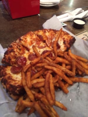 Photo of Replay Sports Bar - Milwaukee, WI, US. Fries and pizza basket for 8.99