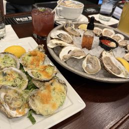 Char Broiled Oysters Pearlz with raw oysters