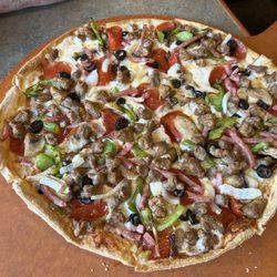 Pizza Hut - Medium supreme on thin crust.