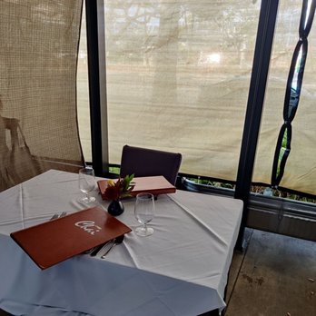 Chef Chai - Our covered table on the sidewalk of Kapiolani Boulevard - Asian Fusion Near Me - Honolulu, Hawaii