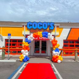 Exterior outside entrance of The Party Pond - Grand opening arch for Coco's grill! Exterior outside entrance of The Party Pond - Grand opening arch for Coco's grill!