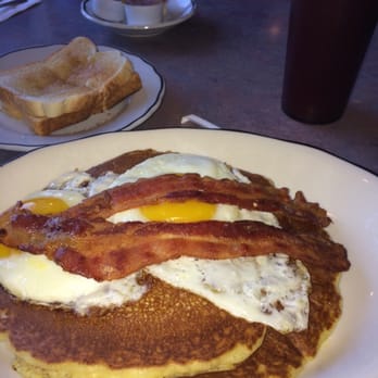 Sunny Side Up - Pancakes, eggs, bacon, white toast and tomato juice to start my day! #7 on the menu :) - Diners Near Me - Sayreville, New Jersey