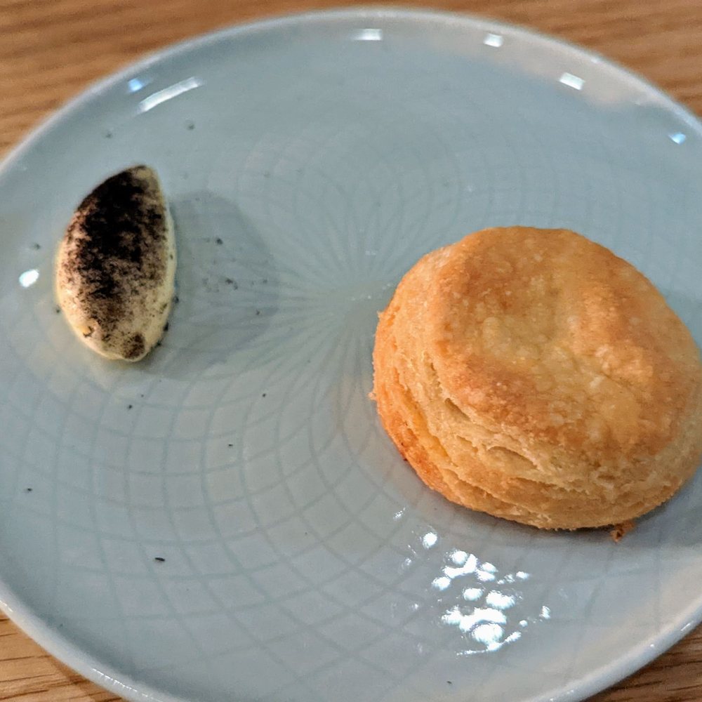 Counter- - Biscuit with Scallion Ash Butter | Instagram: @telephonesmoothie - New American Near Me - Charlotte, North Carolina
