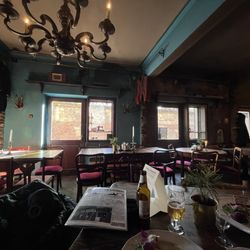 Once Upon A Time - Eating at a table in the restaurant's business themed as a tailor shop.