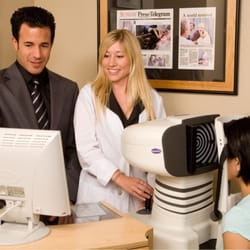 Gregg Feinerman, MD, FACS - Dr Feinerman and Dr Reimers performing specialized scans prior to LASIK.
