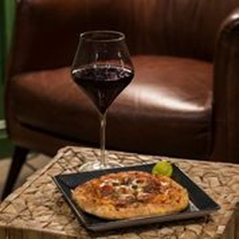 Don Juan Cigar Company - a glass of wine and a pizza - Tobacco Shops Near Me - Baton Rouge, Louisiana