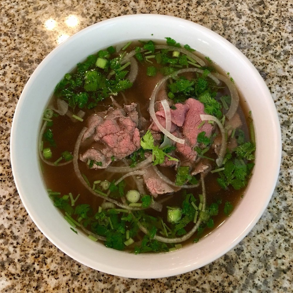 Pho Ly - Pho Tai ($8.00): Kinda pricy, but the flavors are warm and beefy, while the meat is a little chewy. - Vietnamese Near Me - Houston, Texas