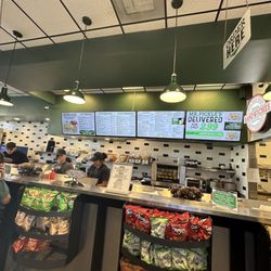 Mr. Pickle's Sandwich Shop - Sandwich counter, menu