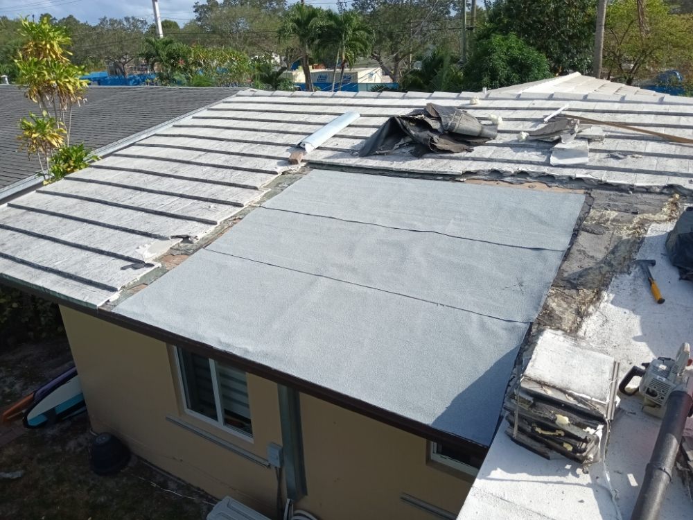 Slide of Babel Roof Repairs