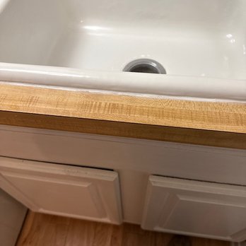 Electro Bond Refinishing - terrible job on laundry tub, caulk job - Refinishing Services Near Me - Bolingbrook, Illinois