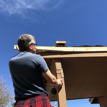 Anderson Roofing & Repair - Removing board to see under it. - Roofing Near Me - Phoenix, Arizona