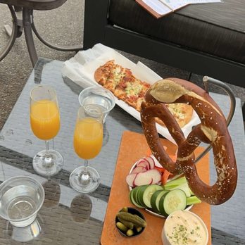 Treveri Cellars - Drinks, seasonal flatbread and pretzel. - Wine Tasting Room Near Me - Wapato, Washington Treveri Cellars - Drinks, seasonal flatbread and pretzel. - Wine Tasting Room Near Me - Wapato, Washington