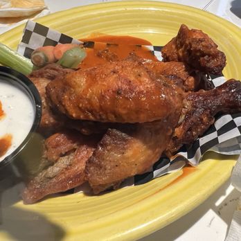 Fire + Ice - Buffalo Wings, $1 each. Very good, large wings. I asked for blue cheese it's either ranch or awful blue cheese. - American Near Me - Boston, Massachusetts