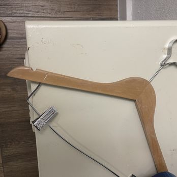 Lone Star Inn & Suites - Broken hanger laying on safe. - Hotels Near Me - Victoria, Texas