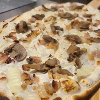 Underbelly - Slinging mushroom tartes all day! - Bars Near Me - Seattle, Washington Underbelly - Slinging mushroom tartes all day! - Bars Near Me - Seattle, Washington