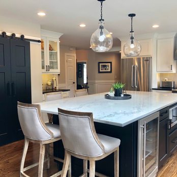 Interactive Remodeling - Kitchen after. Wall removed, sliding panty doors, large 5'x9' island with tons of storage - General Contractors Near Me