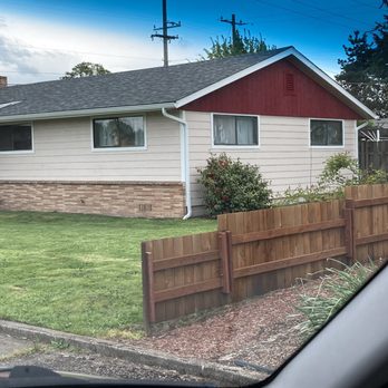 Dahled Up Construction - a view of a house through a car window - General Contractors Near Me Dahled Up Construction - a view of a house through a car window - General Contractors Near Me