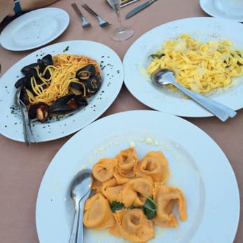 Note di Cucina - Mussels in a red sauce on spaghetti. Butter cheese and basil sauce on flat noodles. Mushroom filled tortellinis. - Italian Near Me - Milan, Michigan Note di Cucina - Mussels in a red sauce on spaghetti. Butter cheese and basil sauce on flat noodles. Mushroom filled tortellinis. - Italian Near Me - Milan, Michigan