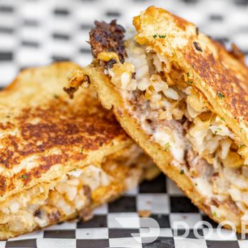 Maxtro's - a grilled cheese sandwich cut in half - Comfort Food Near Me - Orlando, Florida Maxtro's - a grilled cheese sandwich cut in half - Comfort Food Near Me - Orlando, Florida