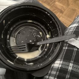 a fork in a plastic bowl