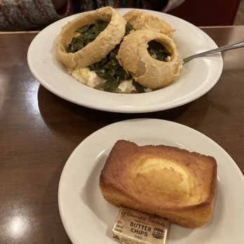 Crystal Beer Parlor - Homemade onion rings cover collard greens,pulled pork,grits and chees - Southern Near Me - Savannah, Georgia Crystal Beer Parlor - Homemade onion rings cover collard greens,pulled pork,grits and chees - Southern Near Me - Savannah, Georgia