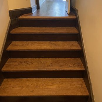 Traditional Quality Hardwood Flooring - a staircase leading to a hallway - Flooring Near Me