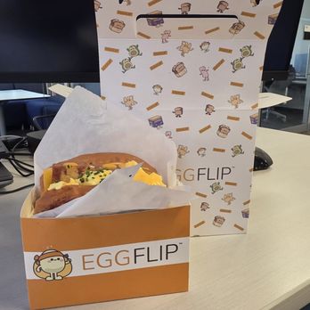 Egg Flip - The sandwich box in front of the to-go box - Breakfast & Brunch Near Me - Minneapolis, Minnesota Egg Flip - The sandwich box in front of the to-go box - Breakfast & Brunch Near Me - Minneapolis, Minnesota