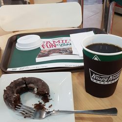 Krispy Kreme Doughnuts - Their signature coffee and chocolate glazed cake