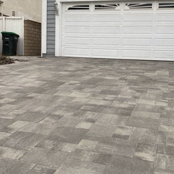 Artis Landscape - a driveway in a residential neighborhood - Lawn Services Near Me Artis Landscape - a driveway in a residential neighborhood - Lawn Services Near Me