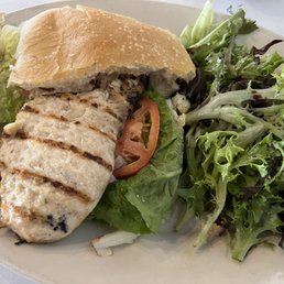 Grilled chicken sandwich and side salad Grilled chicken sandwich and side salad