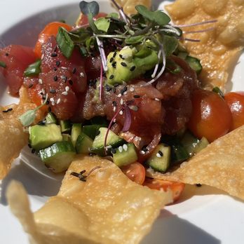 Bluewater Grill - Ahi Tuna Poke Raw tuna, avocado, tomato, cucumber, cilantro, ginger, soy, sesame and chili oil - Seafood Near Me - Avalon, California Bluewater Grill - Ahi Tuna Poke Raw tuna, avocado, tomato, cucumber, cilantro, ginger, soy, sesame and chili oil - Seafood Near Me - Avalon, California