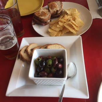 The Grafted Root Eatery - Baked olives and the slow jam'n grill sandwich. - New American Near Me - Grand Blanc, Michigan