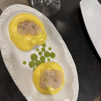 Il Vezzo - Braised leak underneath the hollandaise sauce with scallop on top - Italian Near Me - Florence, FI